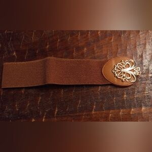 Evolutionary faux leather stretch belt